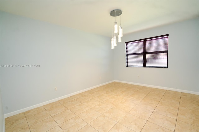 view of tiled spare room