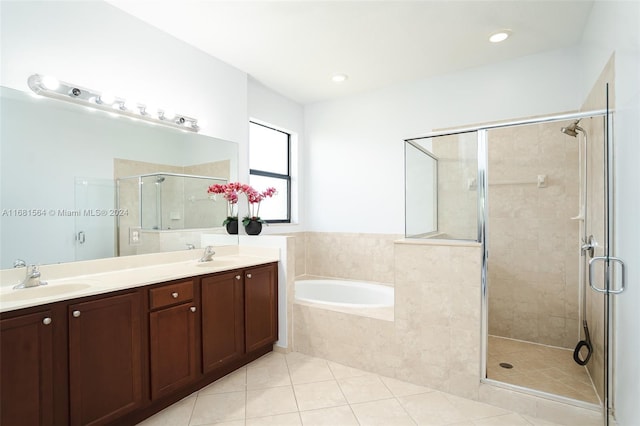 bathroom with vanity, tile patterned floors, and independent shower and bath