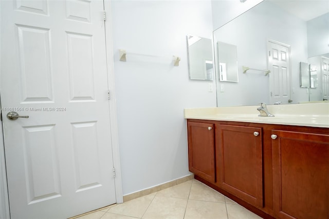 bathroom featuring vanity and tile patterned flooring