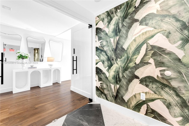 bathroom with vanity and wood-type flooring