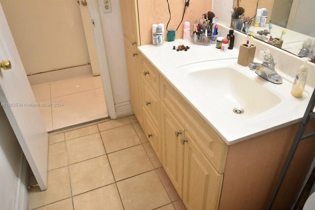 bathroom featuring vanity and tile patterned flooring