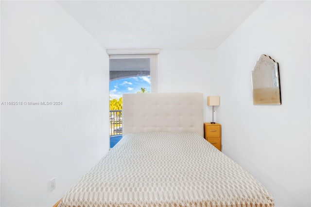 bedroom featuring access to outside and carpet floors