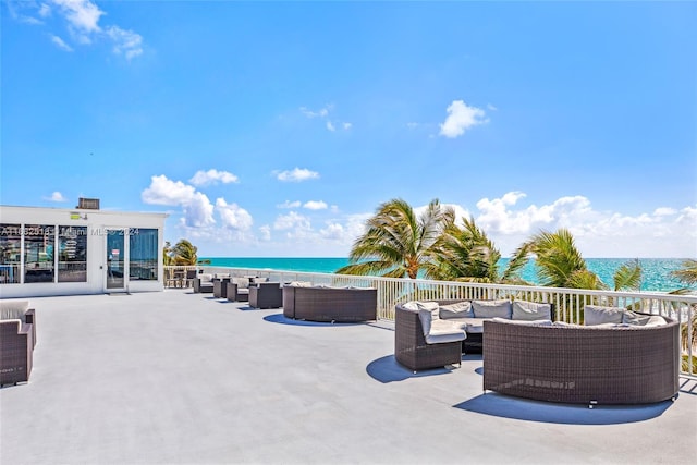 view of patio / terrace with an outdoor hangout area and a water view