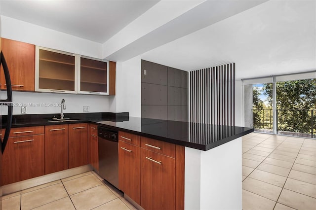 kitchen with kitchen peninsula, light tile patterned floors, stainless steel dishwasher, dark stone countertops, and sink