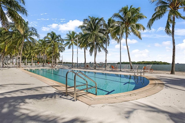 view of swimming pool with a patio area