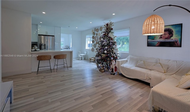 living room with light hardwood / wood-style floors