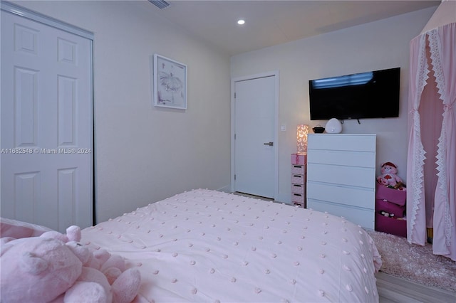 bedroom with light wood-type flooring