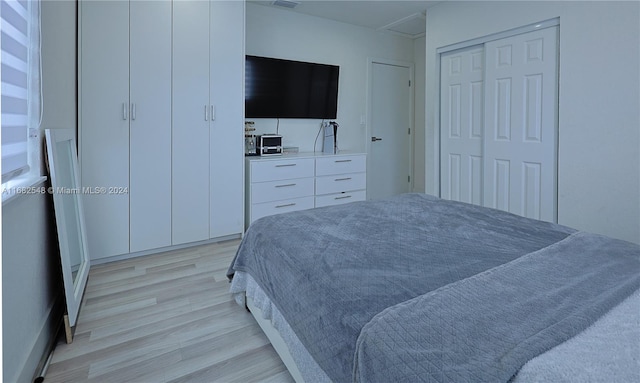 bedroom featuring light hardwood / wood-style floors