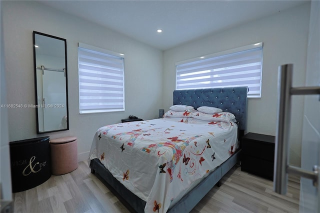 bedroom featuring light hardwood / wood-style flooring