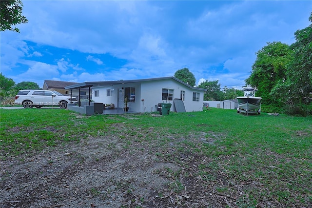 rear view of house featuring a patio area