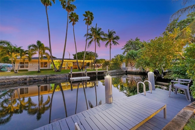 dock area featuring a water view