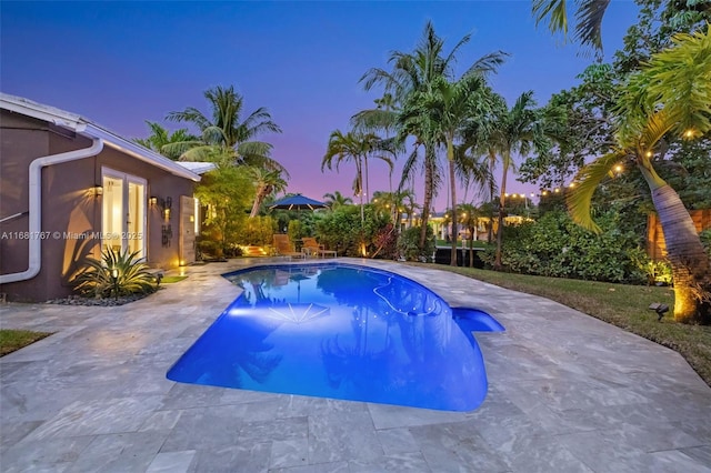 outdoor pool featuring a patio area