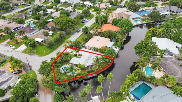 aerial view with a water view and a residential view