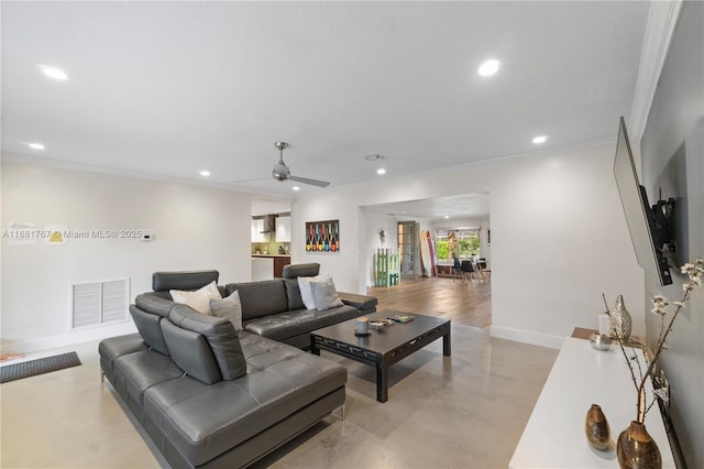 living room with ceiling fan, recessed lighting, visible vents, baseboards, and ornamental molding