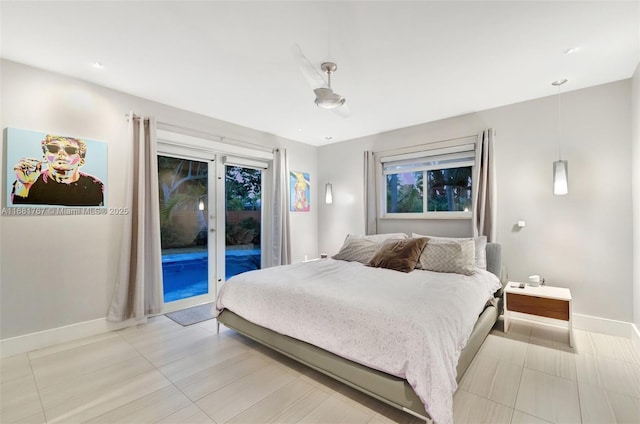 bedroom featuring access to outside, baseboards, and french doors