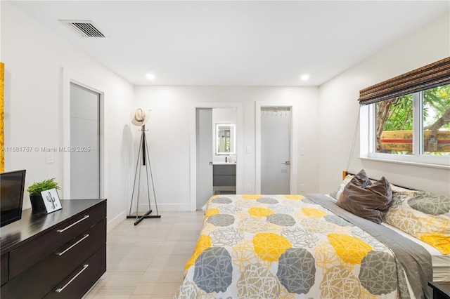 bedroom with light tile patterned flooring, baseboards, visible vents, and recessed lighting