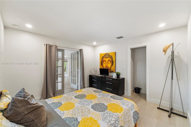 bedroom featuring recessed lighting, french doors, visible vents, and baseboards