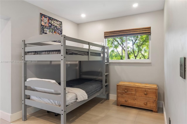 bedroom featuring recessed lighting and baseboards