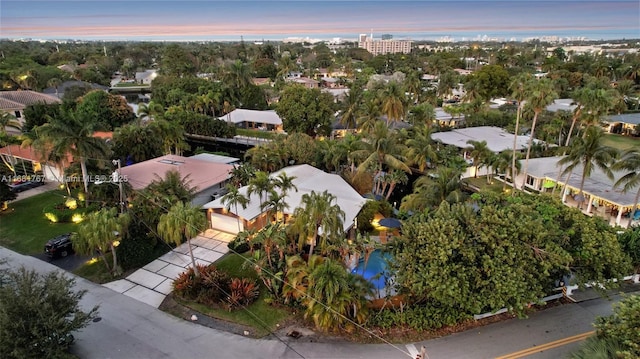 aerial view at dusk with a residential view