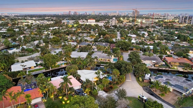 aerial view at dusk with a city view