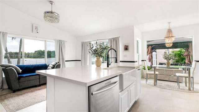 kitchen featuring white cabinetry, sink, hanging light fixtures, an inviting chandelier, and stainless steel dishwasher