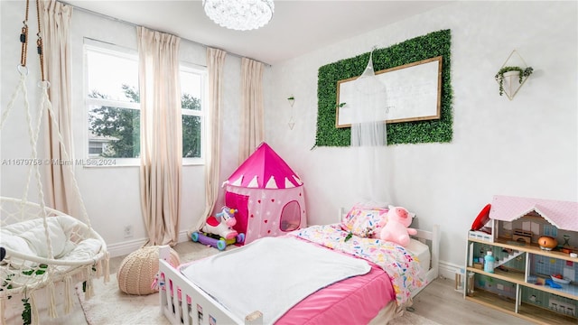 bedroom featuring hardwood / wood-style flooring