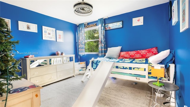 bedroom featuring wood-type flooring