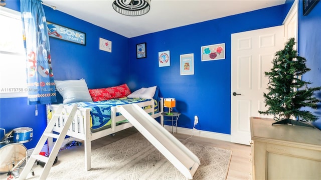 bedroom featuring wood-type flooring