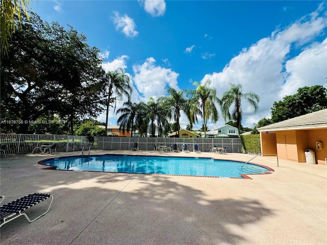 view of pool with a patio area