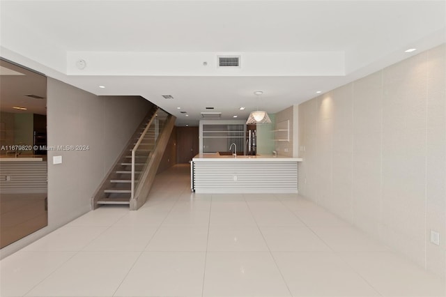 interior space featuring sink and tile patterned floors