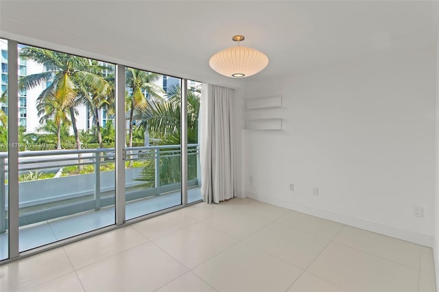 empty room with light tile patterned floors