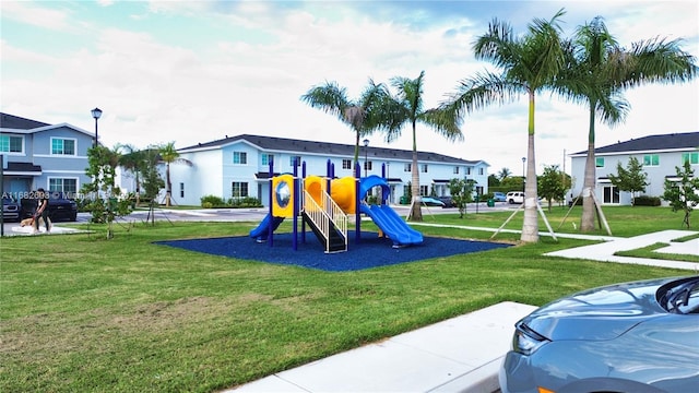 view of playground with a yard