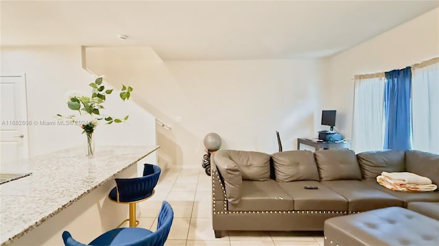 living room with light tile patterned floors