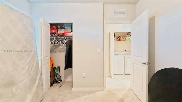 interior space featuring washing machine and clothes dryer