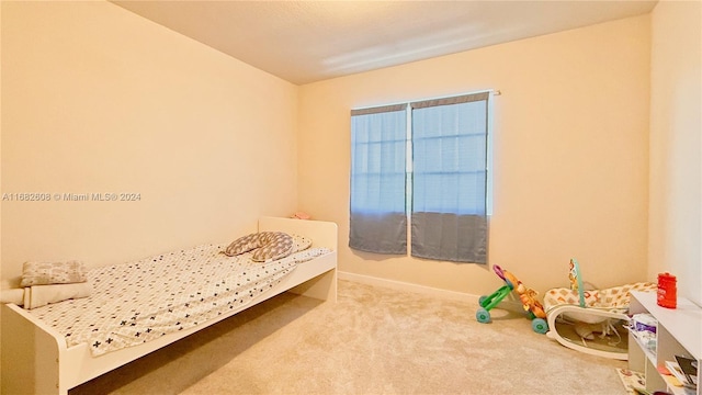 bedroom featuring carpet floors