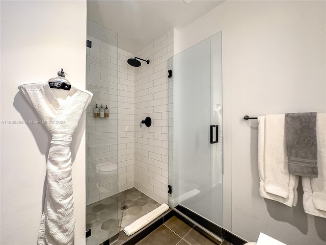 bathroom featuring tile patterned floors and walk in shower