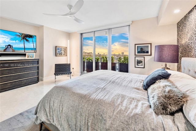 bedroom featuring expansive windows, tile patterned flooring, ceiling fan, access to outside, and baseboards