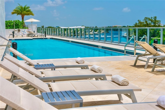 pool with a patio