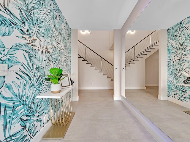 foyer entrance featuring concrete floors