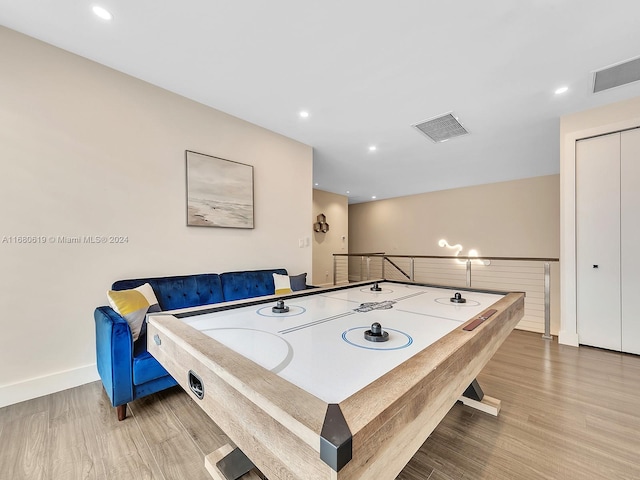 playroom featuring hardwood / wood-style flooring