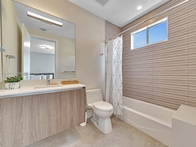 full bathroom featuring vanity, toilet, and shower / bath combination with curtain