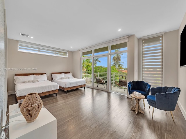 1808 Coral Ridge Dr Unit 1808, Fort Lauderdale, FL 33305 - bedroom with recessed lighting, wood finished floors, visible vents, a wall of windows, and access to outside