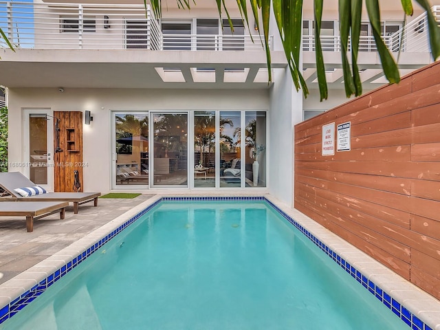 1808 Coral Ridge Dr Unit 1808, Fort Lauderdale, FL 33305 - outdoor pool with fence and a patio