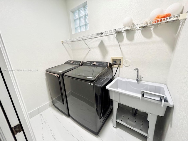 laundry room featuring independent washer and dryer