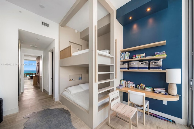 bedroom with light hardwood / wood-style flooring