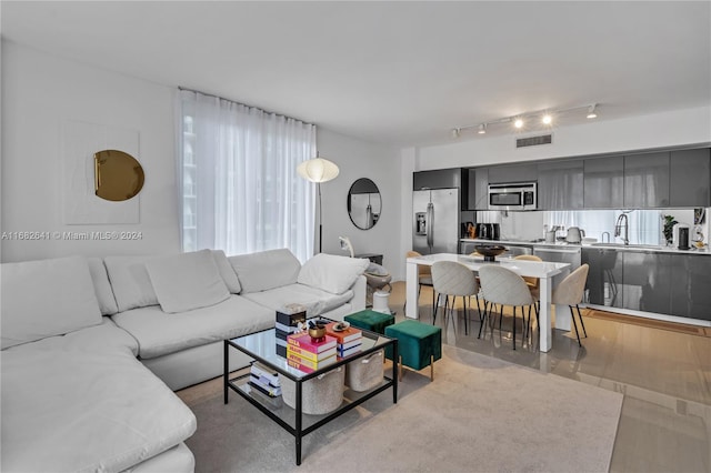 living room featuring sink