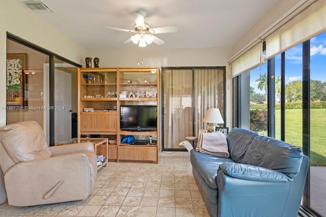 living room featuring ceiling fan