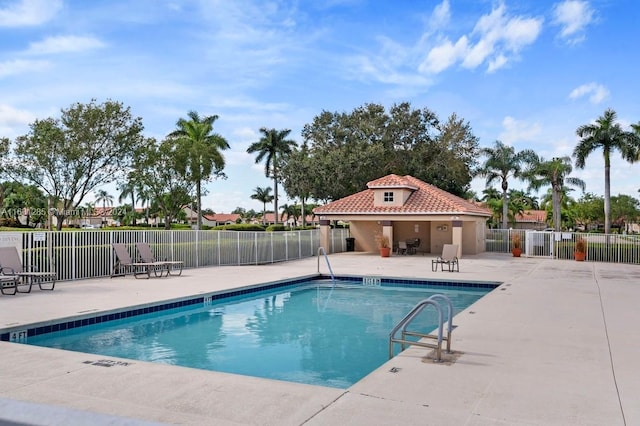 view of swimming pool featuring a patio area