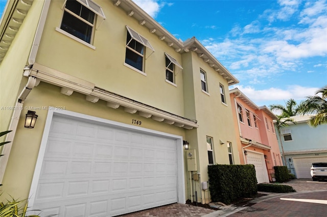 view of property featuring a garage