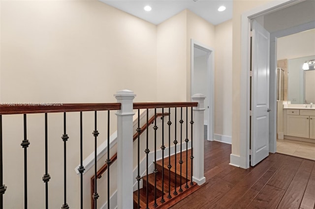 hall with dark hardwood / wood-style floors